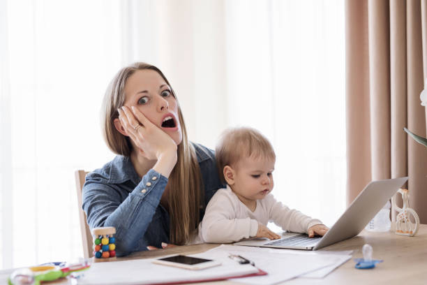istock Mother in horror working from home 823789342