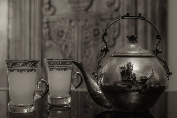 Victorian style pair of cups and a teapot