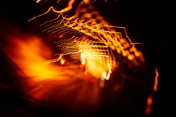 istock Red abstract trails of light on dark background. 823793256