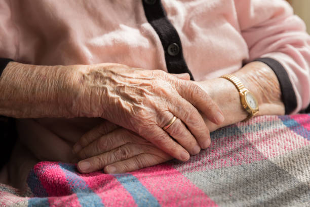 istock Close-up of senior woman's hands 823793456