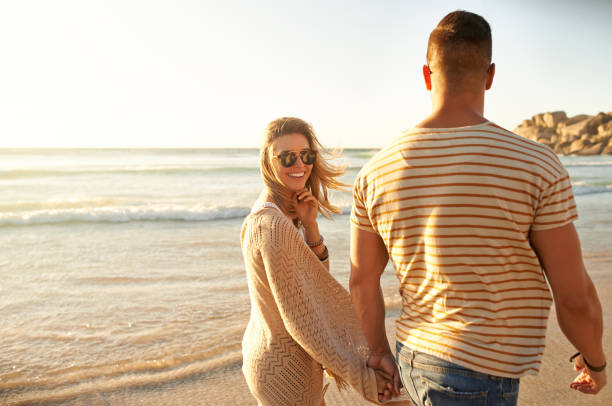 istock Long walks on the beach are our thing 823819432