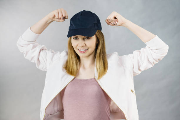 istock Young woman showing her arm muscles 823822542