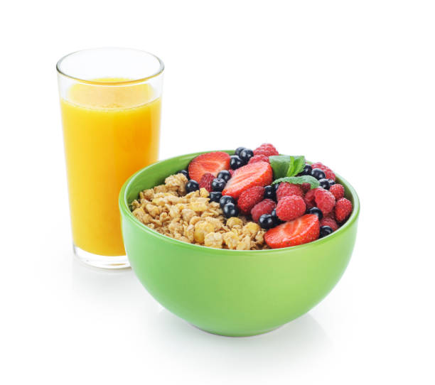 istock Muesli with fresh berries in a bowl isolated on white background. 823823300