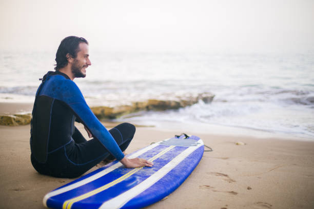 istock Surfer by the sea 823831444