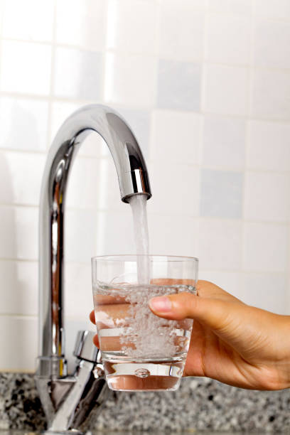 istock Filling glass of water 823838298