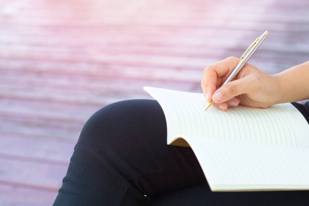 istock Writing dairy on notebook, concept as memory of life and education 823839060
