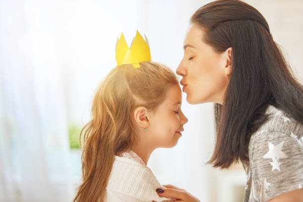 istock Mother and daughter playing and hugging 823839638