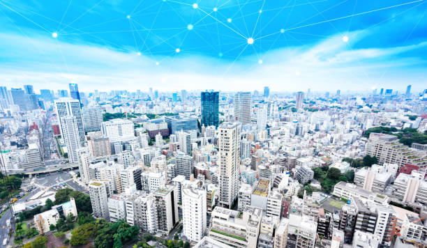 istock panoramic modern city skyline bird eye aerial view under dramatic glow and beautiful dark blue sky 823840118