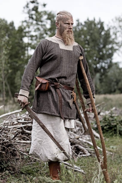 istock Authentic Caucasian Bearded Viking Warrior in Outdoor Forest Setting 823840384
