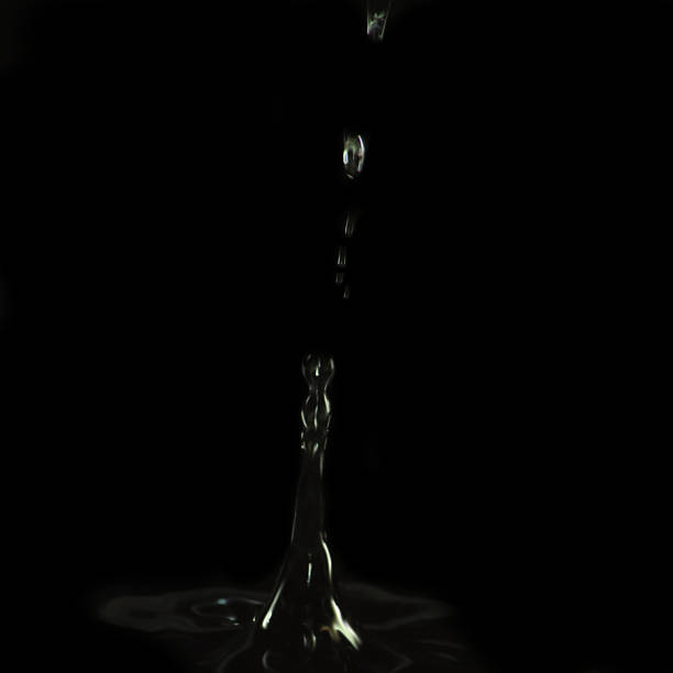 istock Dripping liquid, formed  large gray column with  divorce, lot drops. 823840504