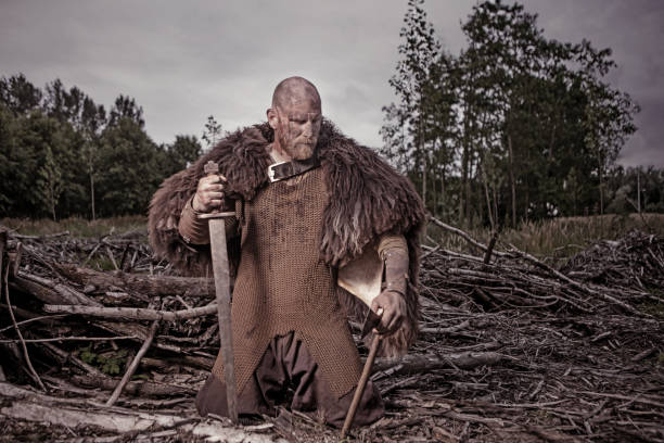 istock Authentic Caucasian Bearded Viking Warrior in Outdoor Forest Setting 823845802