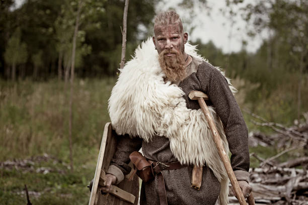 istock Authentic Caucasian Bearded Viking Warrior in Outdoor Forest Setting 823846094