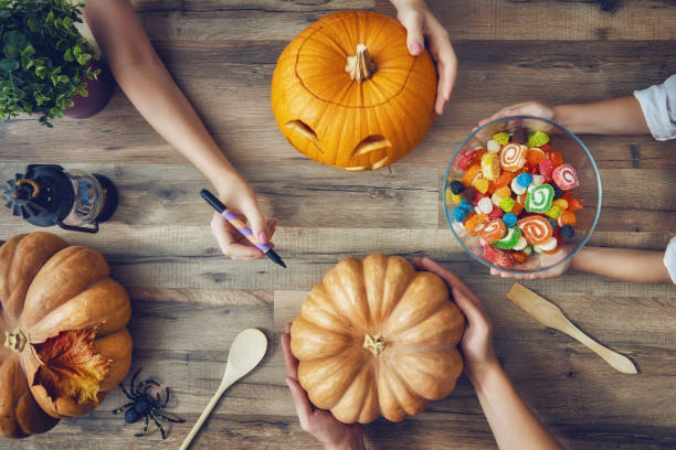 istock family prepares for Halloween 823854252