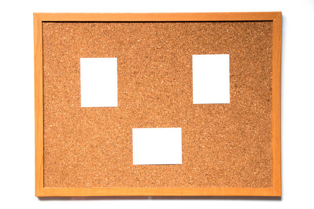 istock Brown cork board with wood frame and have paper to note attachment on white background 823857184