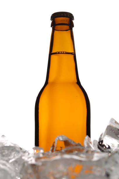 istock Bottle of ale in ice. Close up. White background 823866672