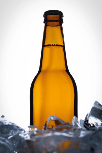 istock Bottle of malt in ice cubes. Close up. White background 823866720