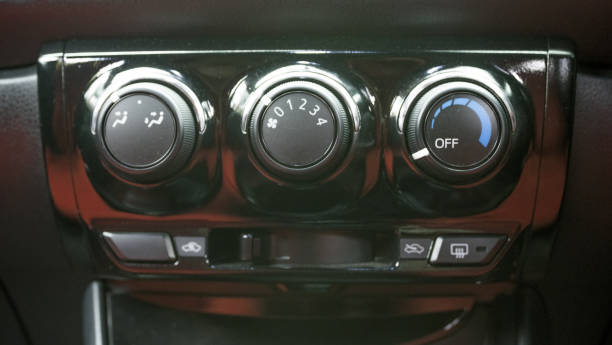 istock Air conditioner switch in console eco car 823869786