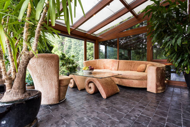 istock Stylish orangery with potted plants 823869914