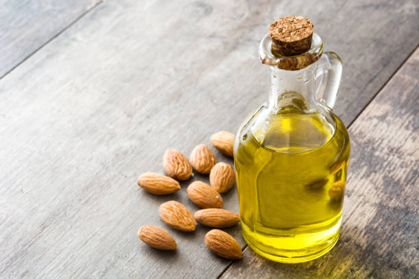 istock Almond oil in bottle 823875468
