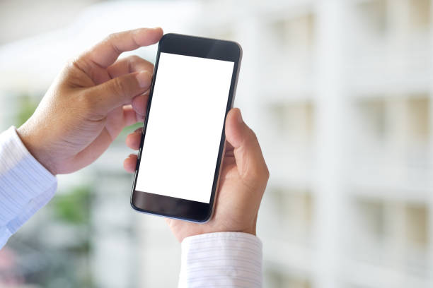 istock Blank screen smartphone in male hand. 823876482