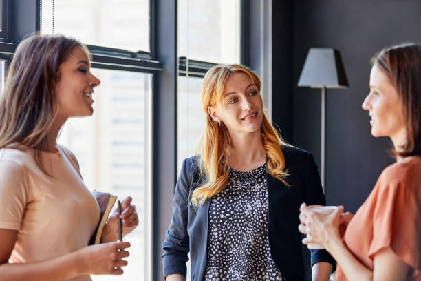 istock Multi-ethnic businesswomen discussing in office 823880234