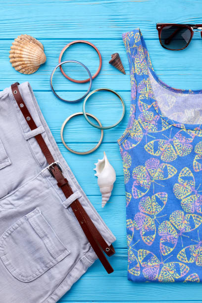 istock Denim shorts and stylish shirt. 823886458