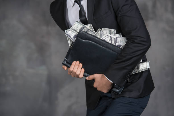 istock Money Cash Finance Corruption Illegal Transaction Concept 823886932