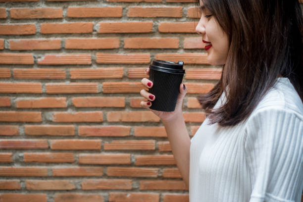 istock Woman is drinking coffee. Relax lifestyle concept. 823894694