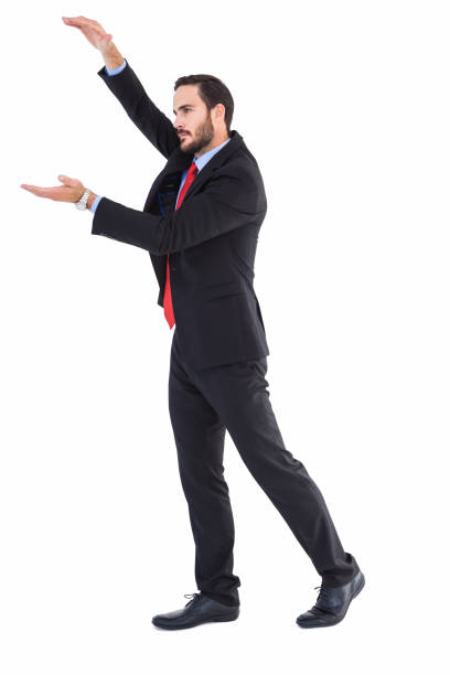 istock Businessman showing something with his hands 823898494