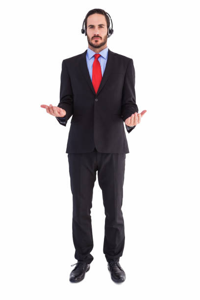 istock Businessman wearing headphone while holding with hands 823898868