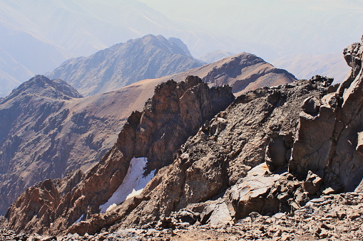 Atlas Mountains in Morocco. Treking on the highest peak. Sharp peaks of rocks.