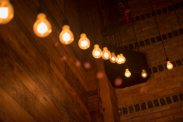 istock Light bulbs in a trendy bar 823909284