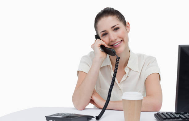 istock Smiling secretary answering the phone 823921170