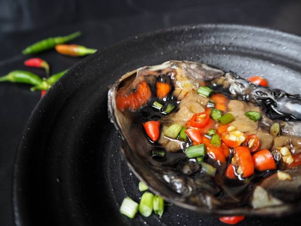 istock Soy sauce marinated crab Korean food on black background 823923938