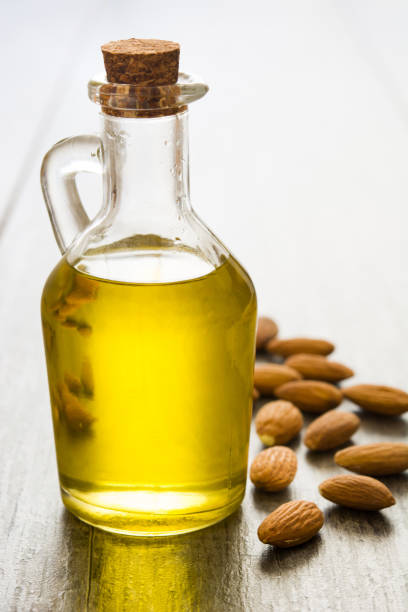 istock Almond oil in bottle 823924762