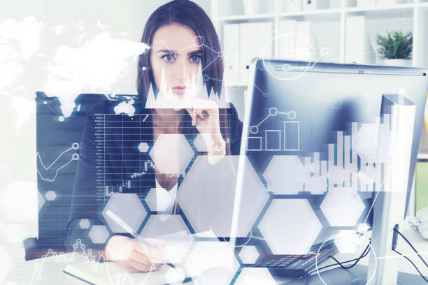 istock Serious businesswoman, graphs and a world map 823935970