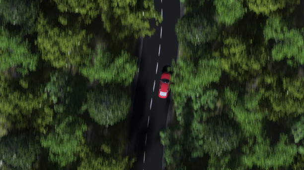 istock Aerial top down view of red car speeding on a forest road. 3D rendering 823940140