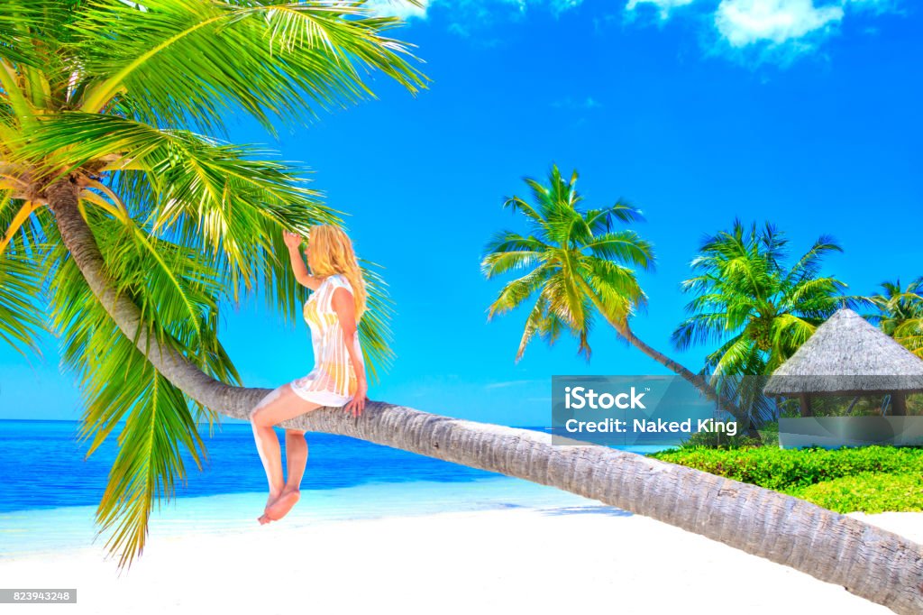 Dreamscape Escape with beauty girl on Maldives Adult Stock Photo