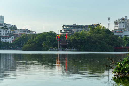 HaNoi, Viet Nam- july 27,2017: Hoan Kiem Lake  also known as Sword Lake, is a lake in the historical center of Hanoi, the capital city of Vietnam. The lake is one of the major scenic spots in the city and serves as a focal point for its public life.