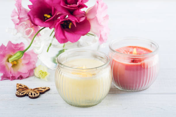 istock Pink red eustoma flowers and butterfly 823960156