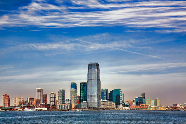 Colgate Center Rising from the Hudson Riverfront in Jersey City Colgate Center rising from the Hudson Riverfront in Jersey City jersey city stock pictures, royalty-free photos & images