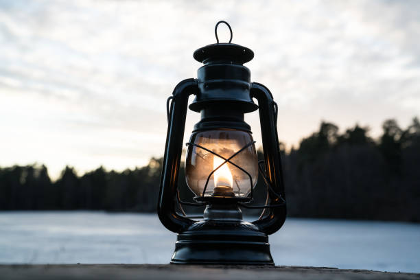istock Vintage lantern near a lake in Norway 823972908
