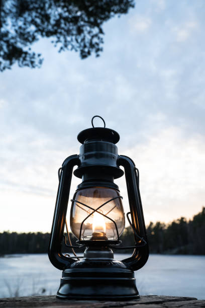 istock Vintage lantern near a lake in Norway 823973128