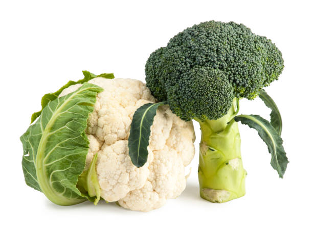 istock Fresh Broccoli and Cauliflower isolated on white 823973224