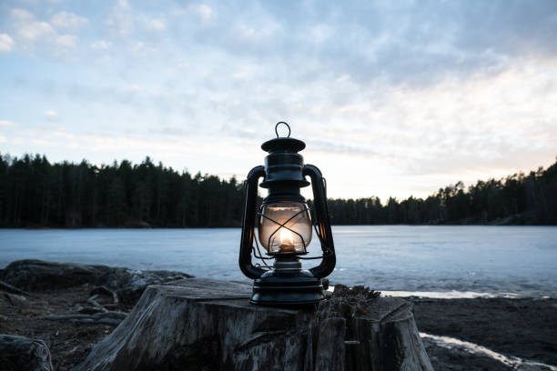 istock Vintage lantern near a lake in Norway 823973920