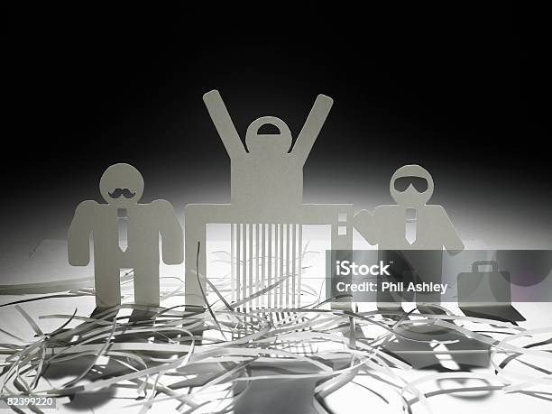 Paper Mafia Shredding A Paper Man Stock Photo - Download Image Now - Paper Shredder, Figurine, Human Representation