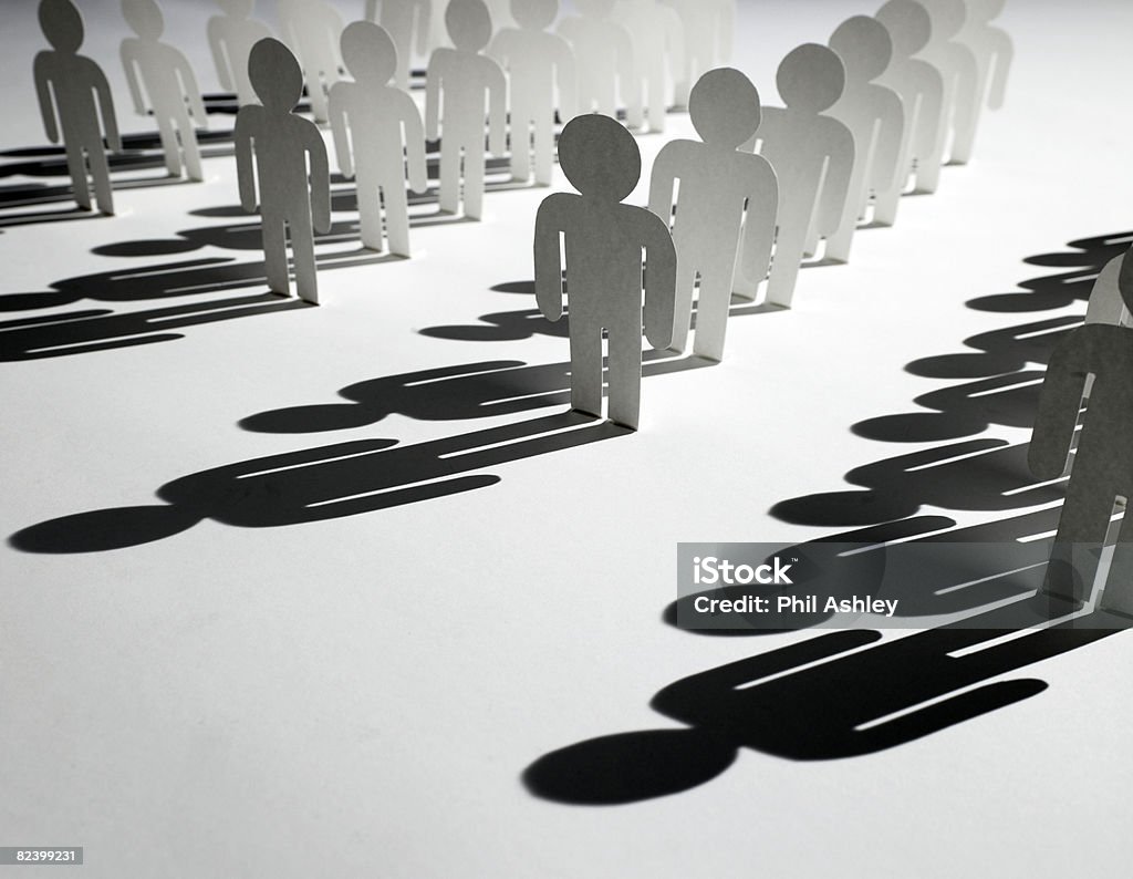 rows of paper people  Color Image Stock Photo