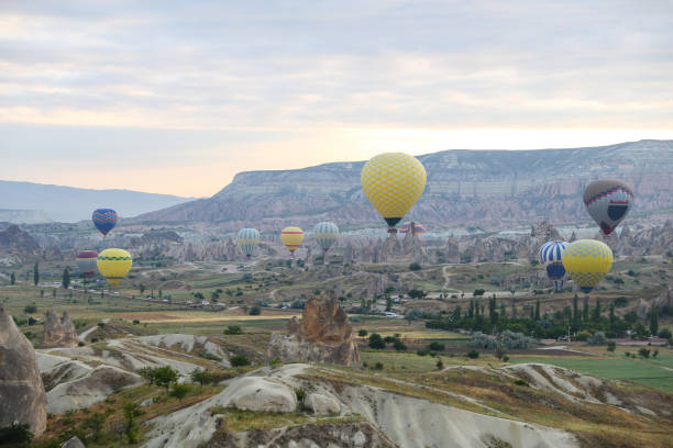 istock Hot Air Balloons in Cappadocia Valleys 823995652