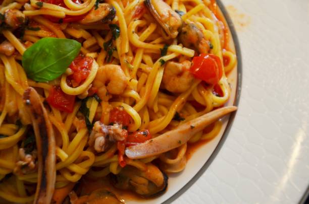 istock fresh italian pasta & sea food 824010260