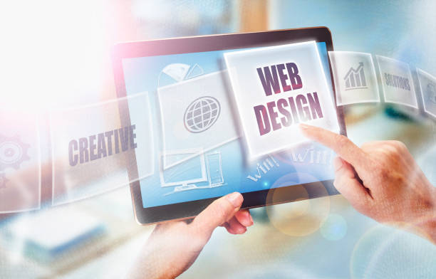istock A businesswoman selecting a Web Design business concept on a futuristic portable computer screen. 824013444